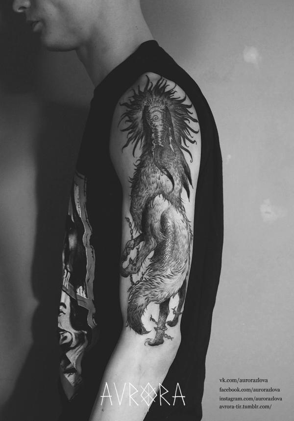 Фото тату татуировка волк пожирающий сол