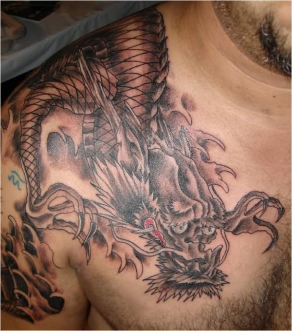 Фото тату Грустный дракон на плече