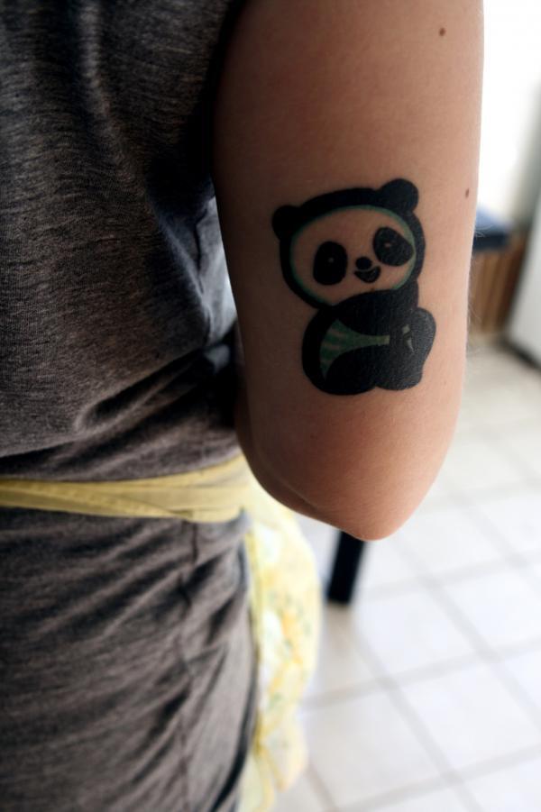 Фото тату Улыбающаяся панда