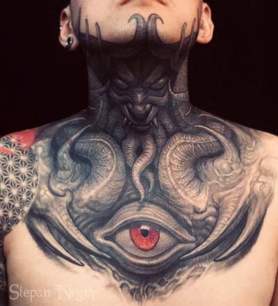 Op art geometrical pattern tattoo on the chest and