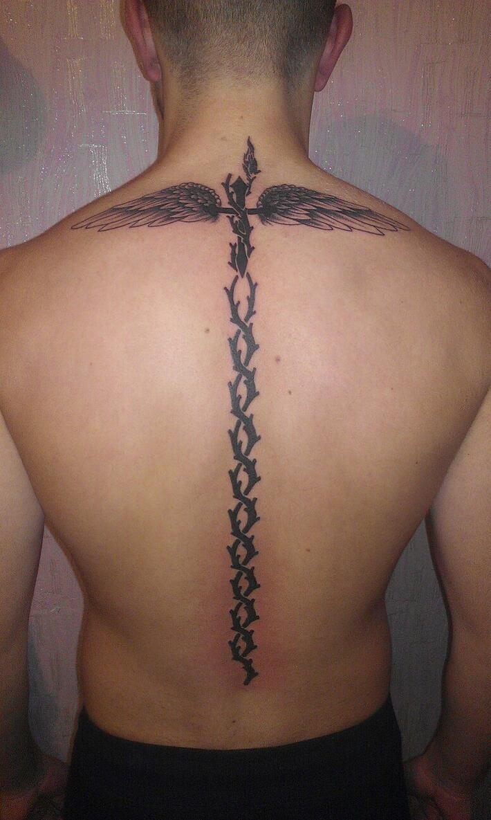 30 Awesome Spine Tattoo Ideas for Men & Women in 2024