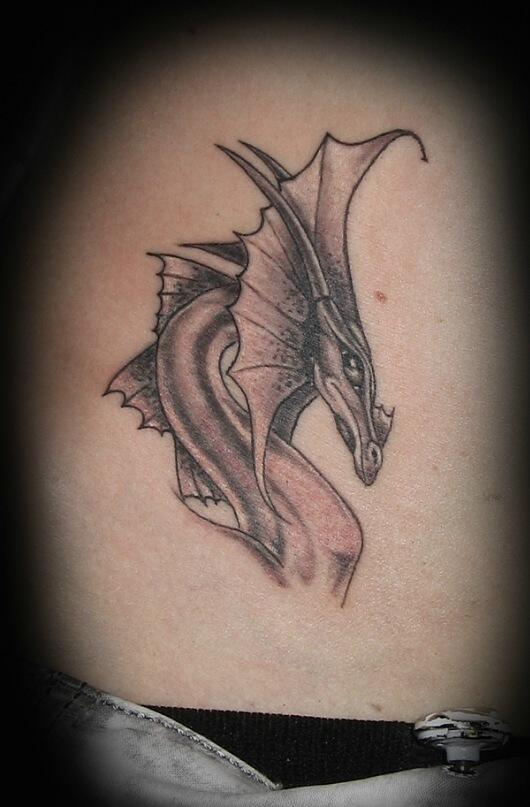 Dragon tattoo that is inspired by the Hungarian Horntail from Harry Potter  done by thegyetvanshow  rtattoo