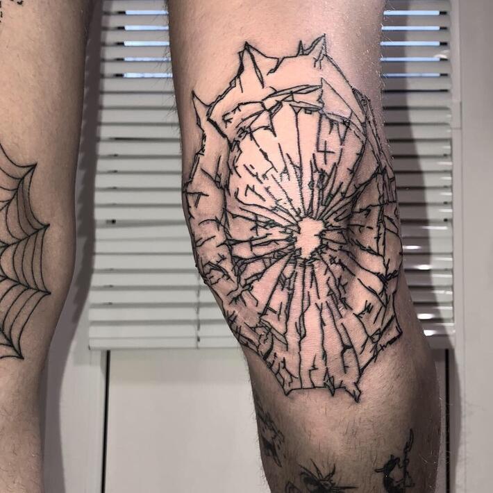 Broken glass hand tattoo by our artist Sam, incredible work | Instagram