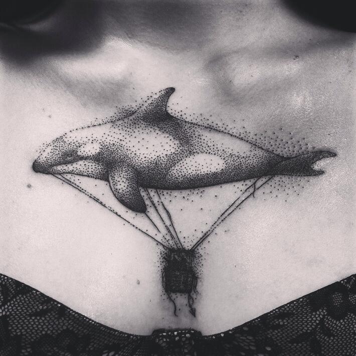 Фото тату Тату дельфины на груди