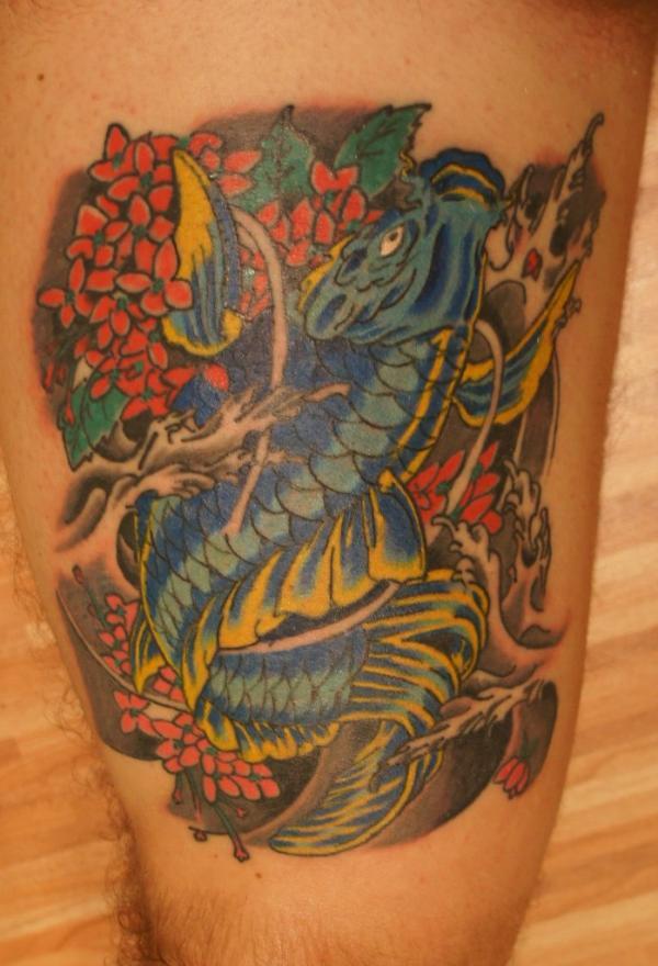 Фото тату Восточный дракон на ноге