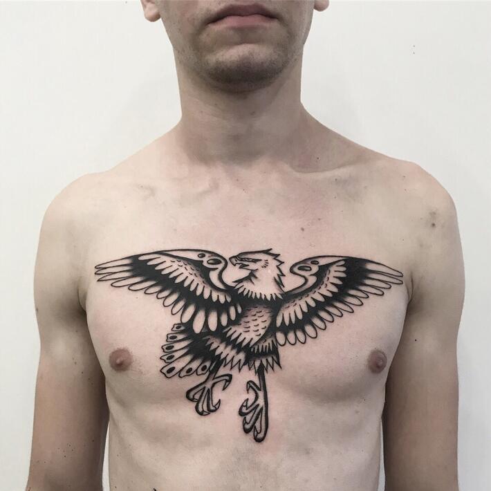 Фото тату Chest eagle tattoo