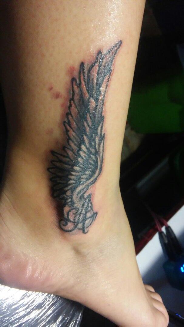 Hermes wings tattoo meaning and symbolism  MyTatouagecom