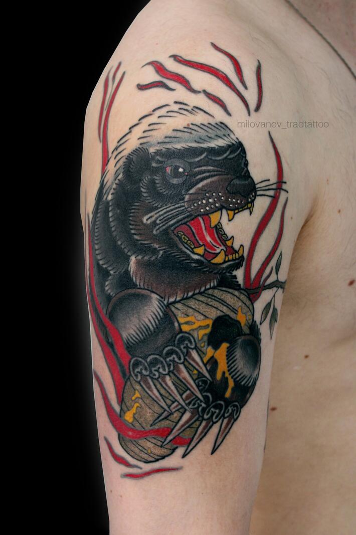 Tattoo uploaded by Tattoodo • #honeybadger #blackandgrey #banner #script  #animal • Tattoodo