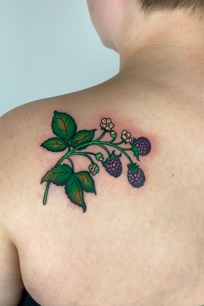 Elegant Botanical Blackwork Tattoo