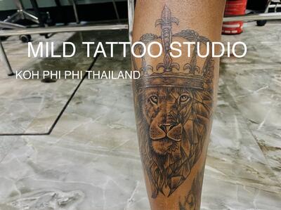 Lion tattoo bamboo tattoo styl