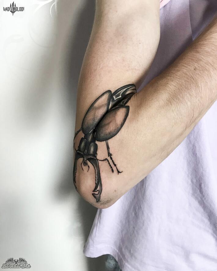 Gorillaz themed sleeve tattoo with volkswagen beetle on Craiyon