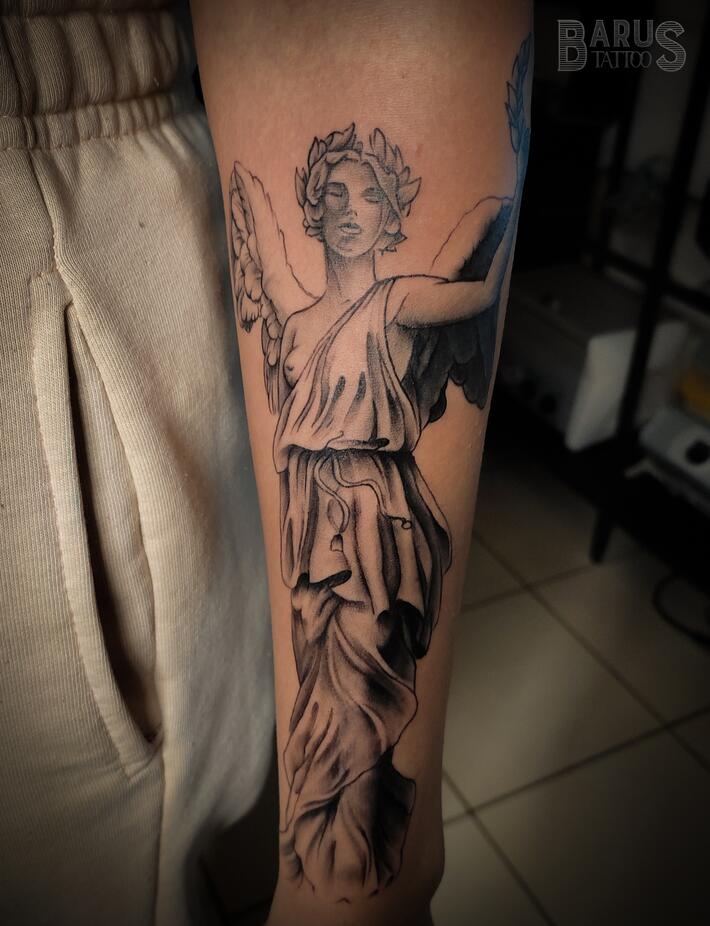 Oscar Akermo on Instagram: “Francisco's arm decorated with the Nike of  Samothrace and hidden messages in the geometr… | Greek tattoos, Nike tattoo,  Tattoos for guys
