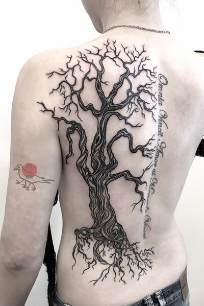 Added this Arbutus branch wraparound to Stacey's existing Raven tattoo! The  bird was perched on a piece of branch - so we tied in and wrapped around  with... | By Lewcid InkFacebook