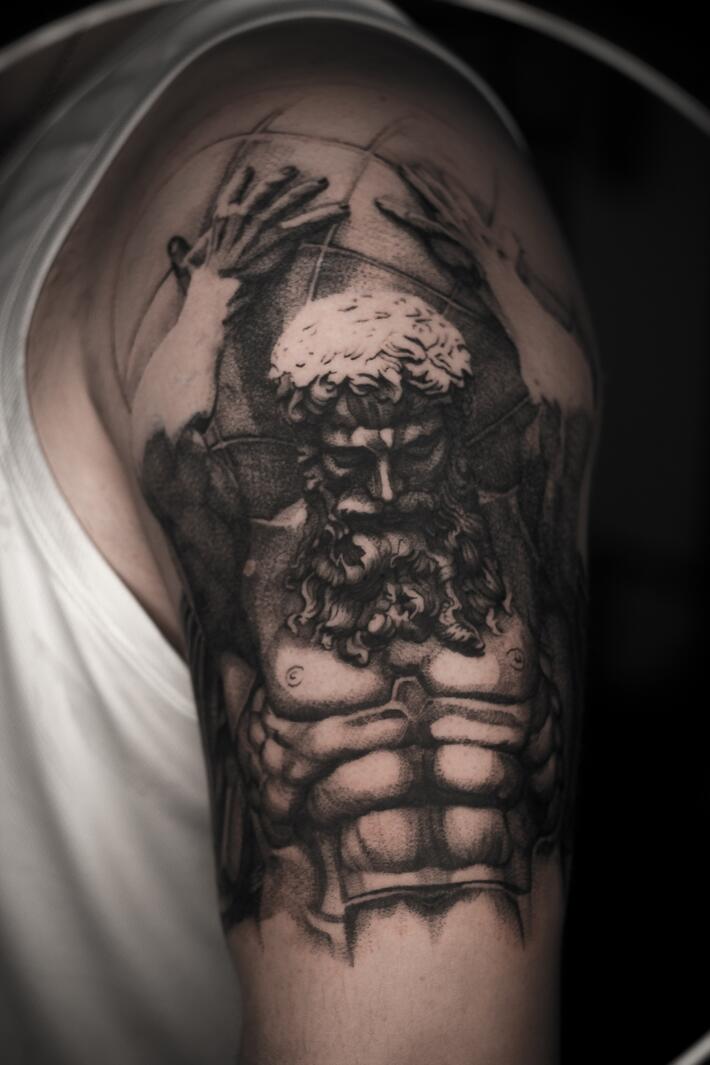 Black Ink Greek Atlas Tattoo On Man Right Half Sleeve