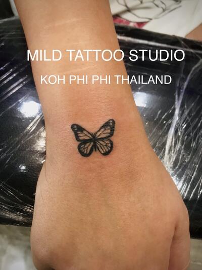 Butterfly tattoo bamboo tattoo