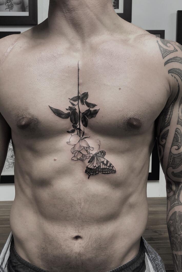 Sternum tattoos: What you need to know – Stories and Ink